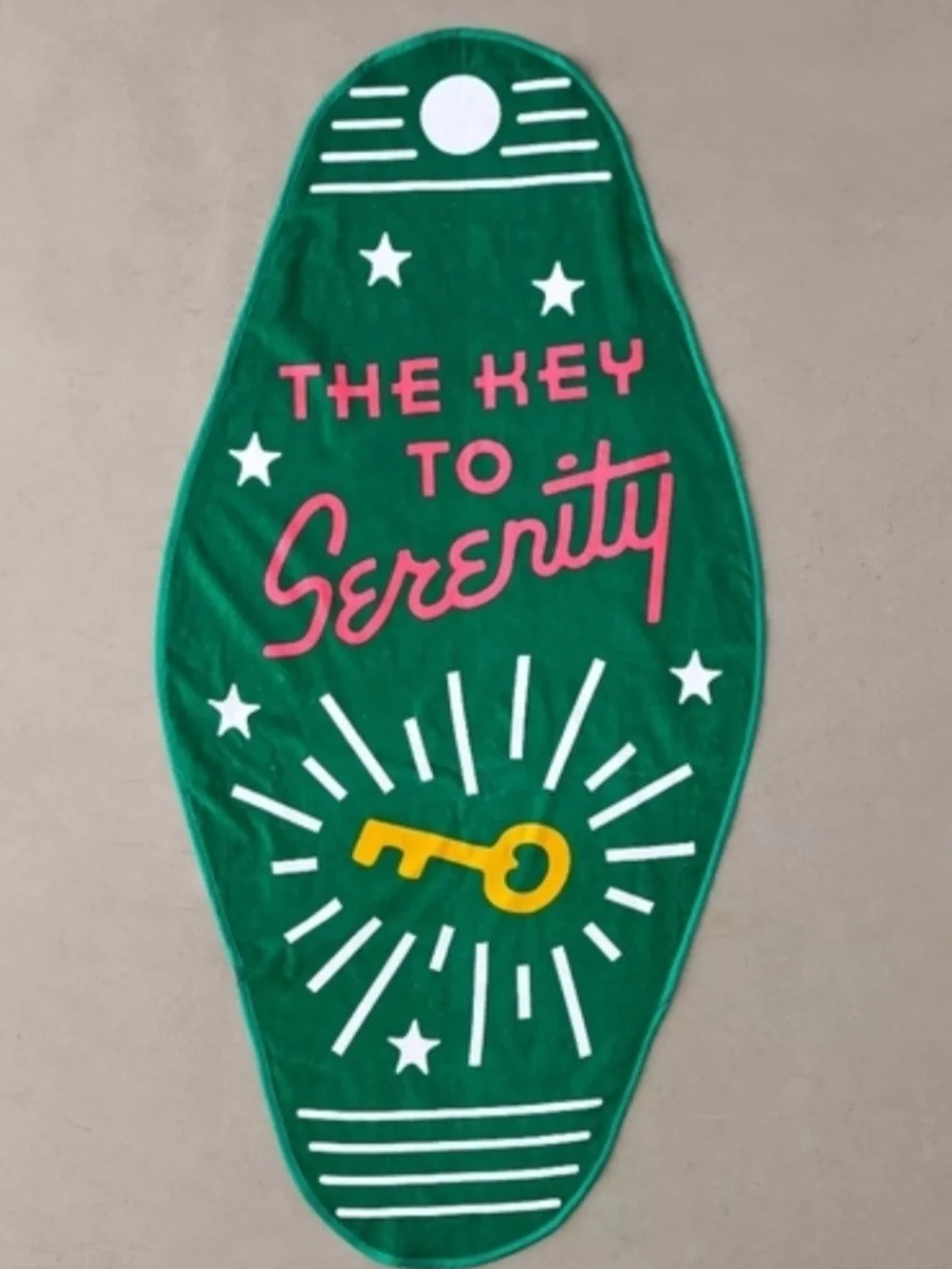 ban.do Green Beach Towel with Pink Typography and Yellow Key Graphic